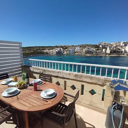 Апартаменты Blue Harbour Seafront Penthouse With Large Terrace With Panoramic Sea Views - By Getawaysmalta *