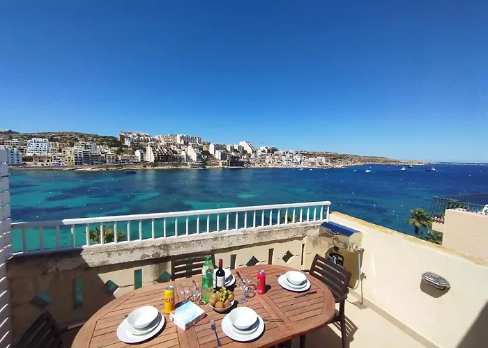 Blue Harbour Seafront Penthouse With Large Terrace With Panoramic Sea Views - By Getawaysmalta
